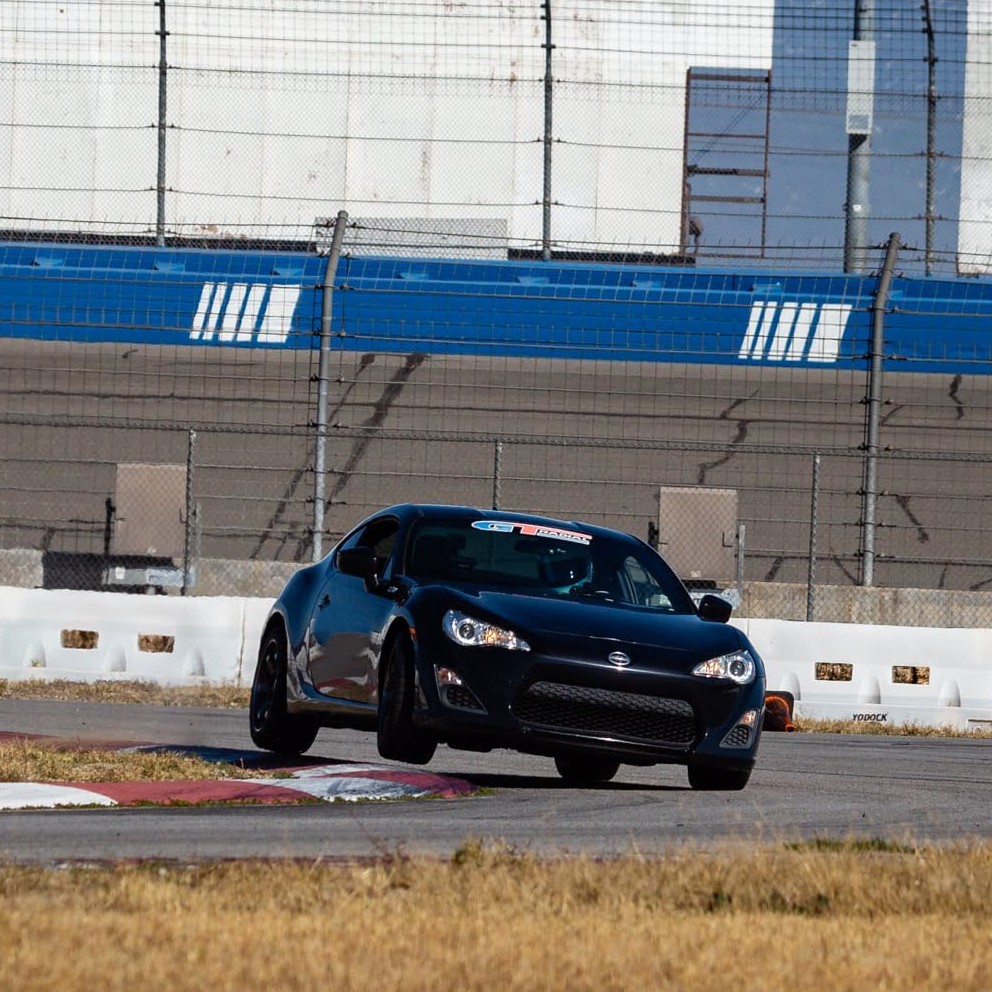 Scott driving a Scion FRS (86) at Auto Club Speedway Fontana, CA
